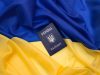 Ukrainian passport on the flag of Ukraine.